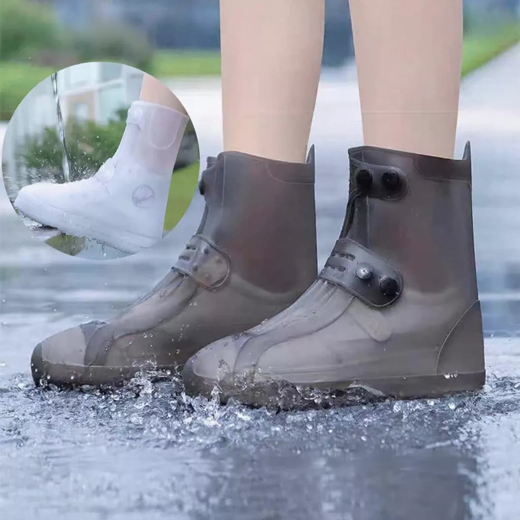 Thickened Waterproof Rain Boot Shoe Covers in black and gray worn over sneakers on a wet street